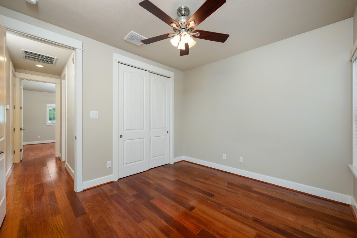 303 Zennia Street Austin, TX 78751 - Photo 33 of 40 wooden floor in an empty room
