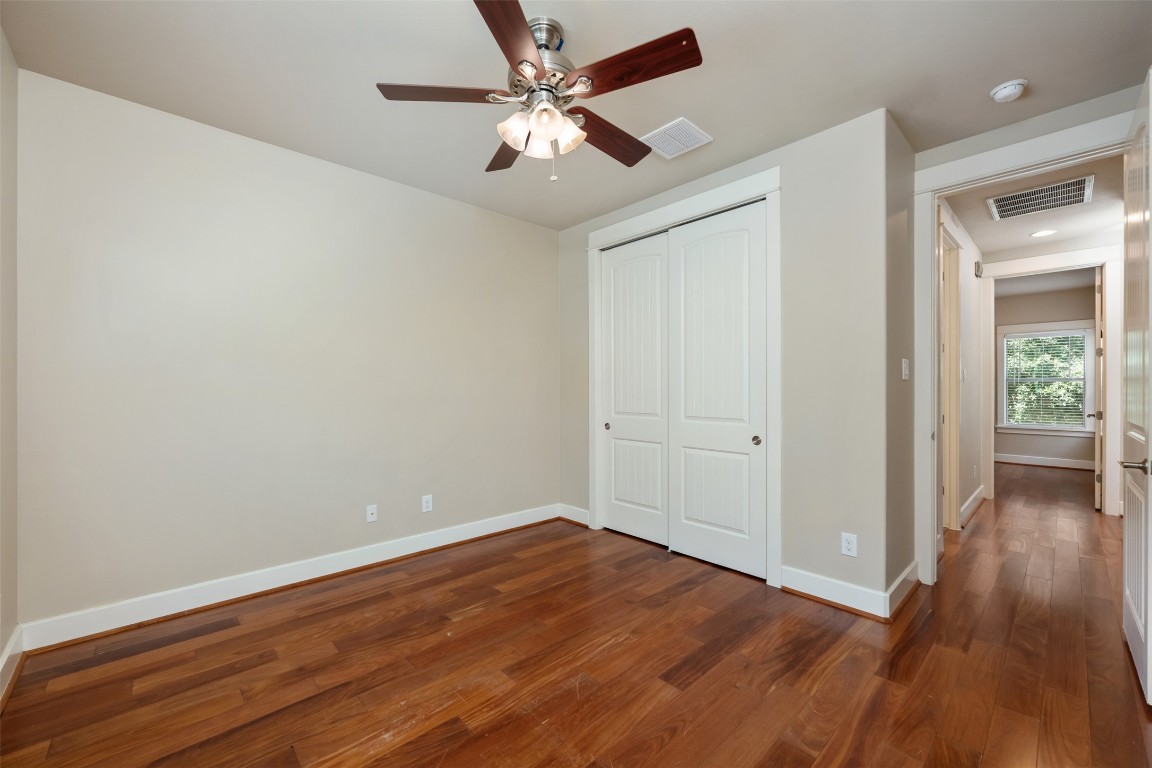 303 Zennia Street Austin, TX 78751 - Photo 37 of 40 wooden floor in an empty room