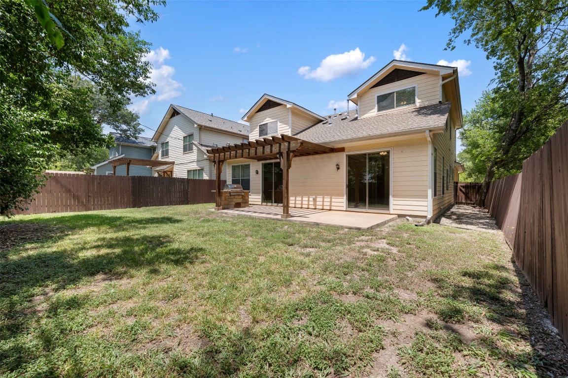 303 Zennia Street Austin, TX 78751 - Photo 9 of 40 a front view of a house with garden