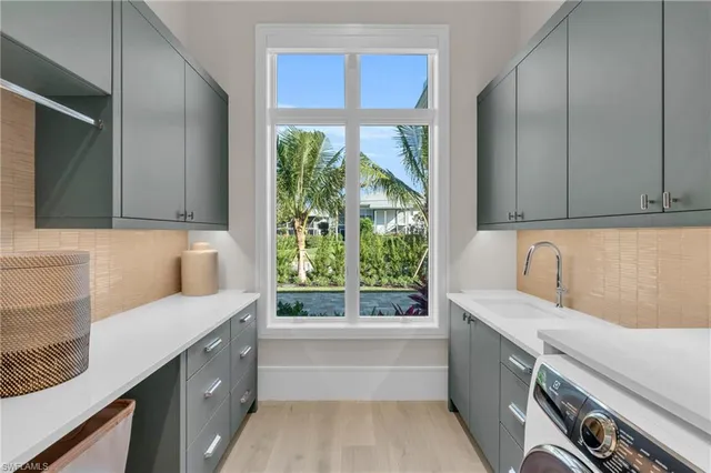 a kitchen with a sink and a window