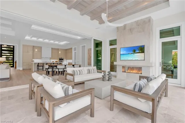 a view of a livingroom with furniture and a table