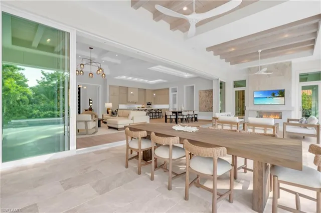 a view of a dining room kitchen with a table and chairs