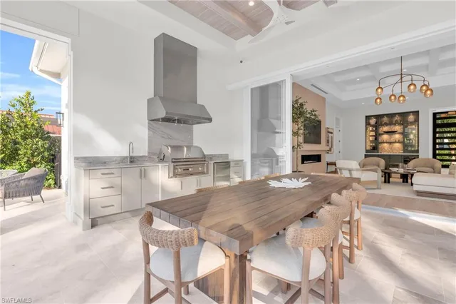 a view of kitchen and dining area with furniture