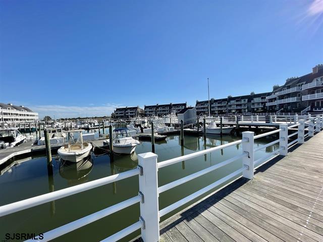 210 Harbour Cove, Unit 210 Somers Point, NJ 08244 - Photo 21 of 30 a view of a balcony with chairs