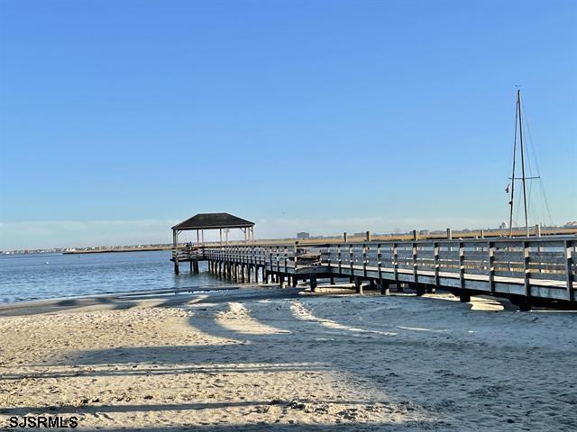 210 Harbour Cove, Unit 210 Somers Point, NJ 08244 - Photo 24 of 30 a view of a terrace with a bench