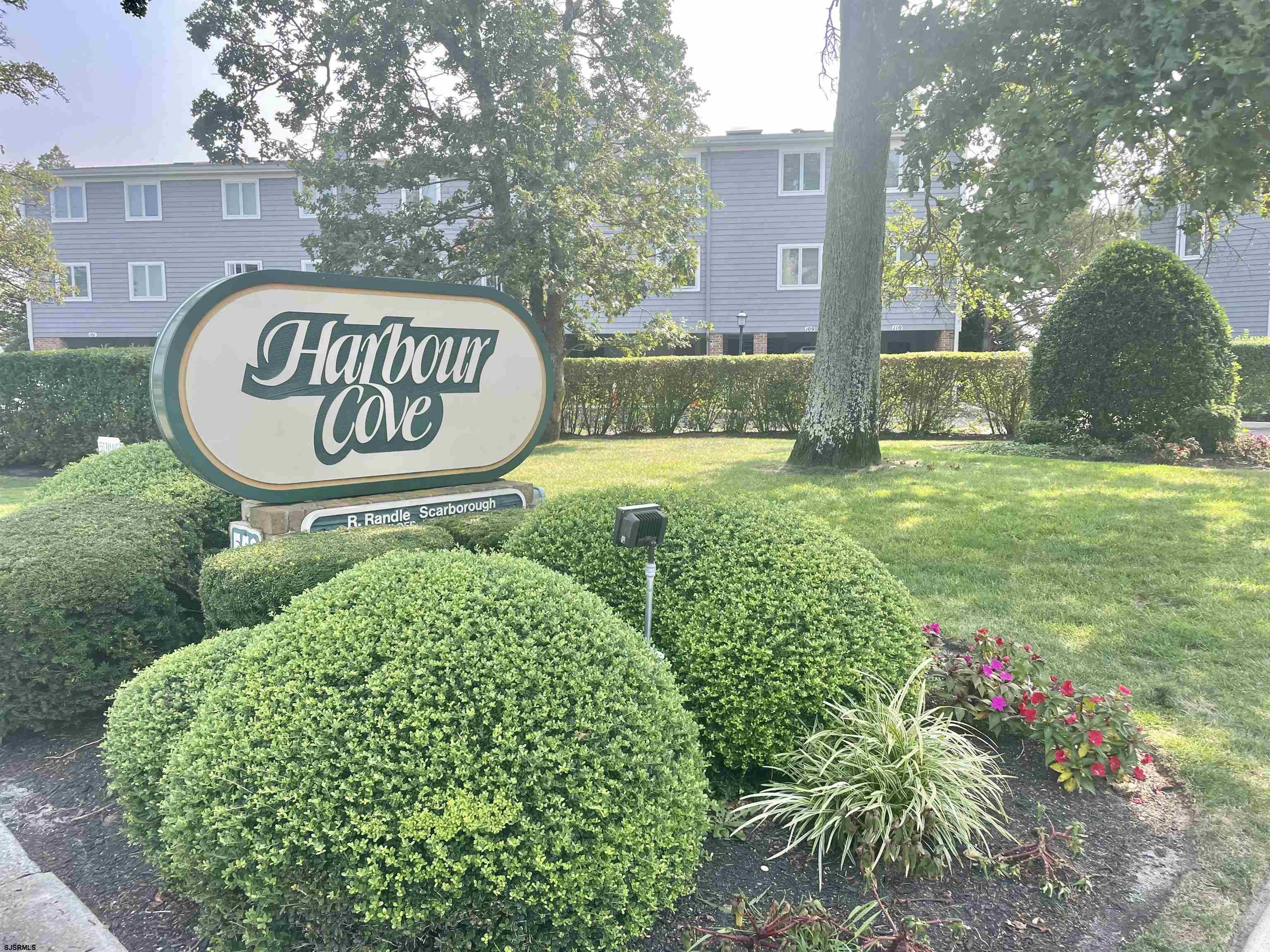 210 Harbour Cove, Unit 210 Somers Point, NJ 08244 - Photo 25 of 30 a sign board with a house and garden