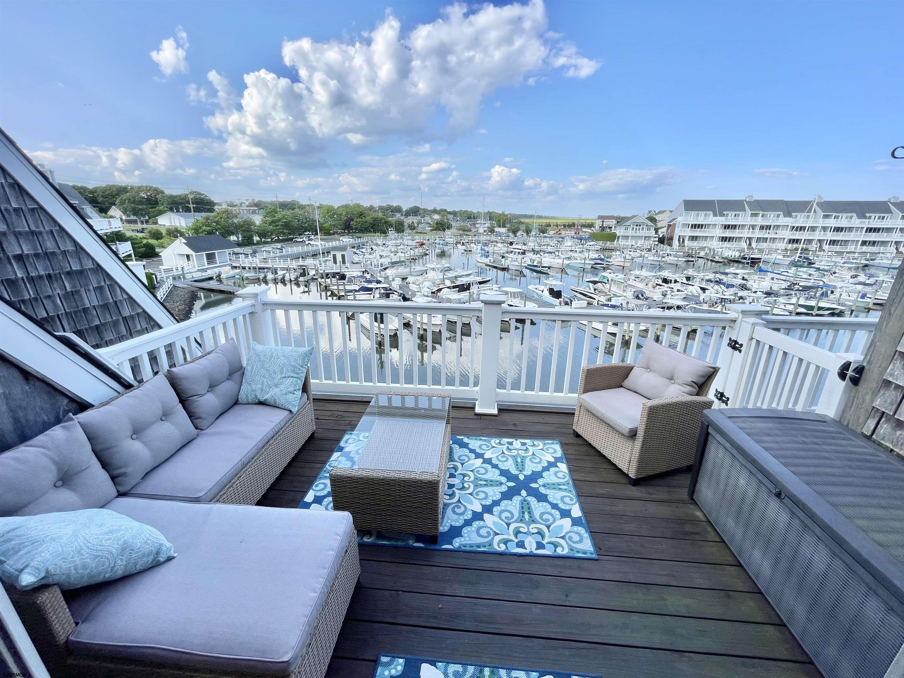 210 Harbour Cove, Unit 210 Somers Point, NJ 08244 - Photo 8 of 30 a view of a terrace with couches