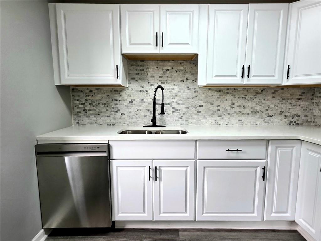 3581 Midway Road Decatur, GA 30032 - Photo 11 of 29 a kitchen with stainless steel appliances granite countertop a sink and a microwave
