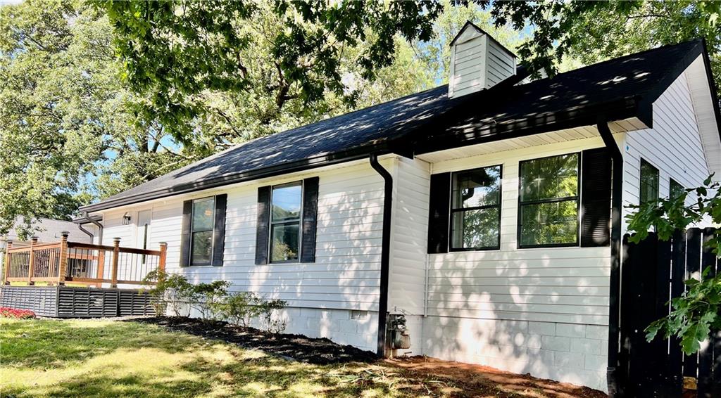 3581 Midway Road Decatur, GA 30032 - Photo 22 of 29 a front view of a house with garden