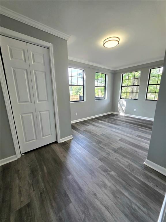 3581 Midway Road Decatur, GA 30032 - Photo 10 of 29 an empty room with wooden floor and windows