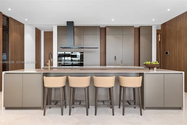 a kitchen with a stove and a refrigerator