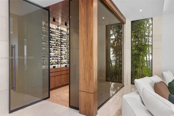 a dining room with furniture and garden view