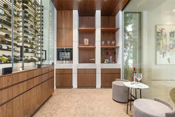 a view of walk in closet and window