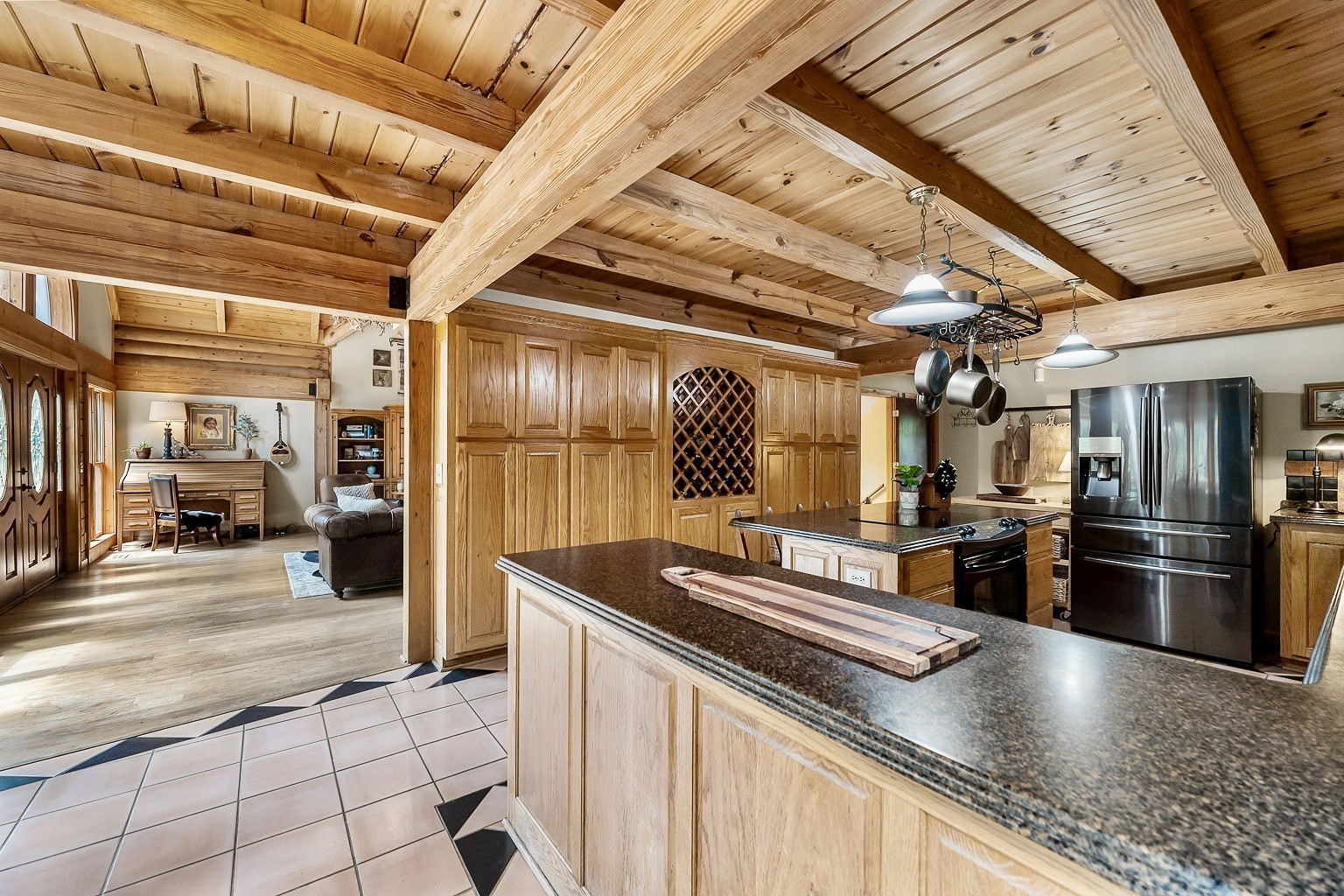 469 Theas Way Liberty, TN 37095 - Photo 12 of 35 a kitchen with stainless steel appliances granite countertop a sink a stove and a refrigerator
