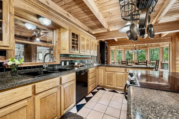 a kitchen with a sink and cabinets