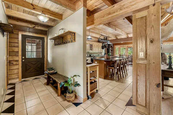 a view of a livingroom with furniture and wooden floor