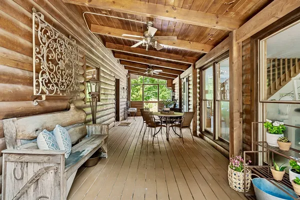 a view of a dining room with furniture window and outside view