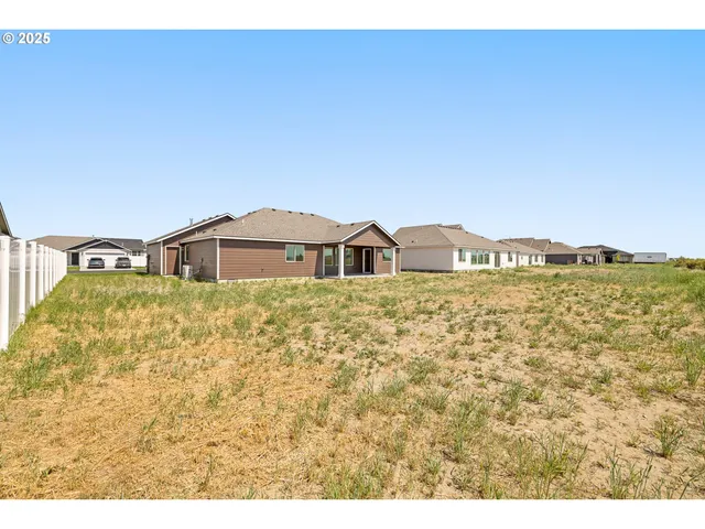 a house view with a garden space