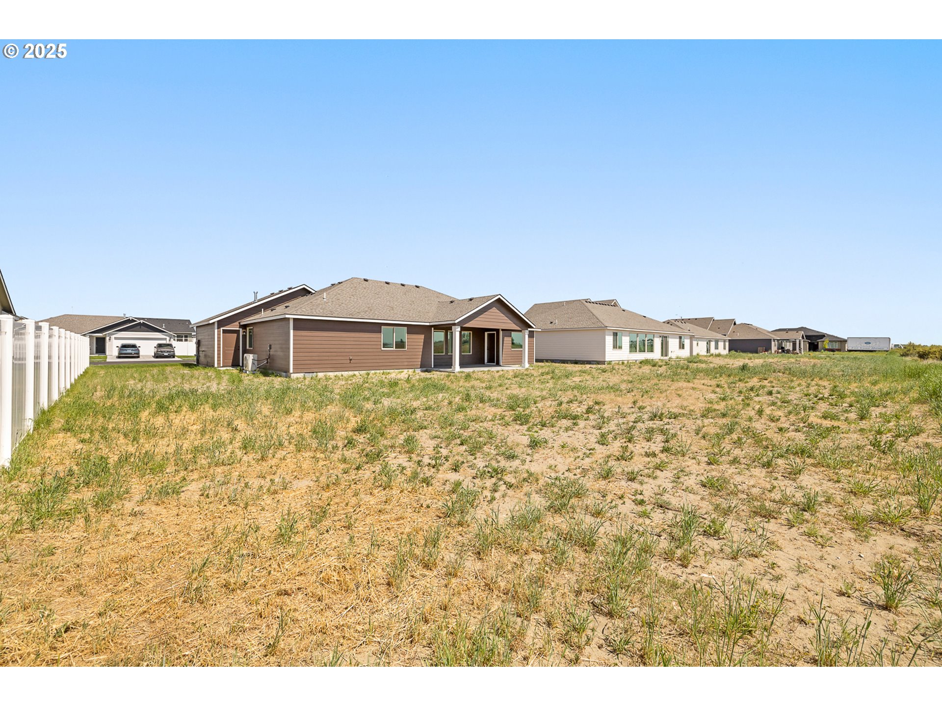 307 Sage Street Boardman, OR 97818 - Photo 23 of 25 a house view with a garden space