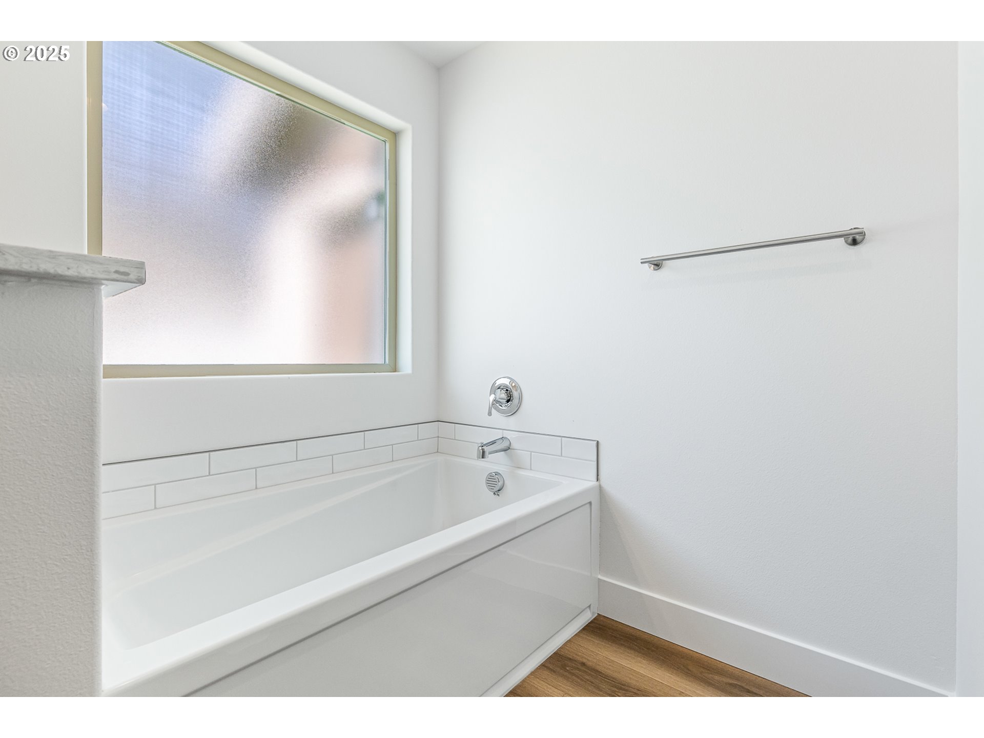 307 Sage Street Boardman, OR 97818 - Photo 8 of 25 a bathroom with a bathtub and a shower