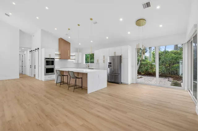 a view of wooden floor in an empty room