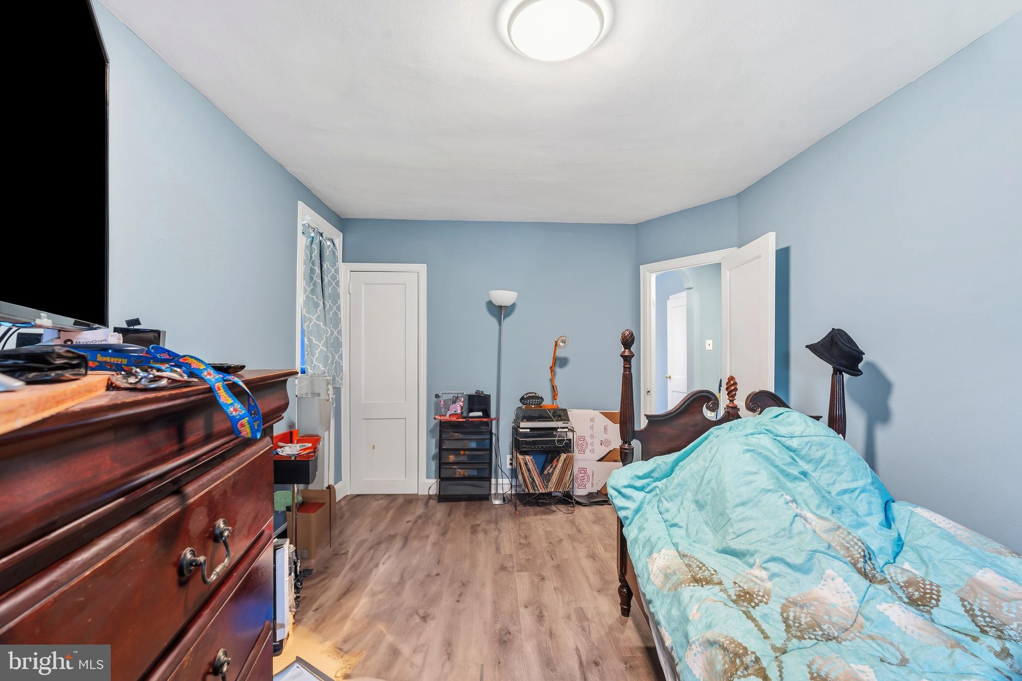 7318 Frontenac Street Philadelphia, PA 19111 - Photo 12 of 13 a bed room with furniture and wooden floor