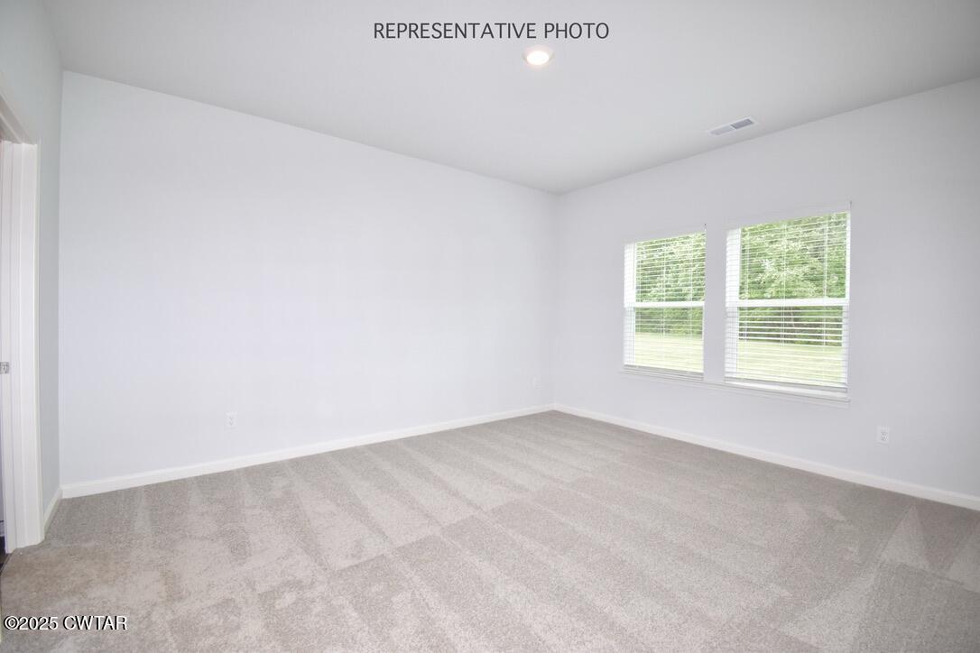63 Clarendon Cove Jackson, TN 38305 - Photo 12 of 18 an empty room with a window