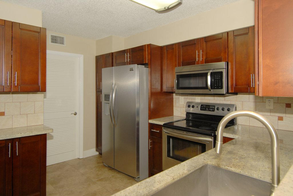 4640 West McNab Road, Unit C2 Pompano Beach, FL 33069 - Photo 9 of 34 Kitchen View 1