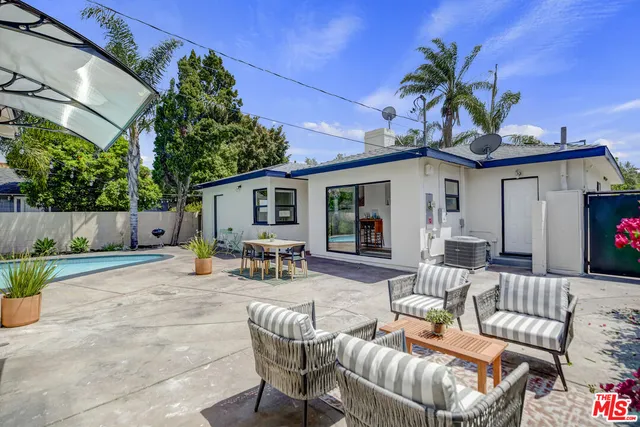 a bed room with a bed and a couch