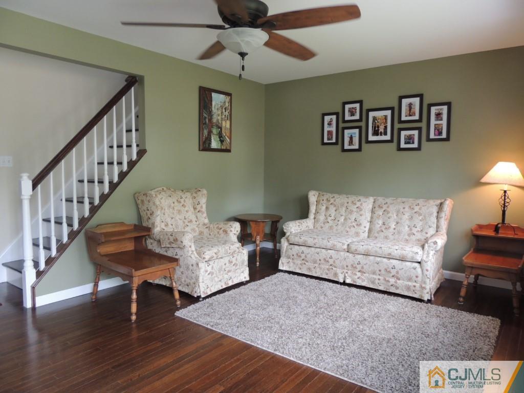 7 Channing Road East Brunswick, NJ 08816 - Photo 2 of 11 a living room with furniture and wooden floor