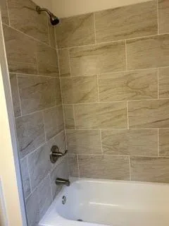 a bathroom with a bathtub