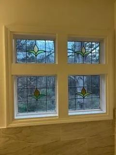 a view of wooden floor and a window