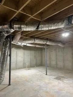 a view of a room with wooden walls