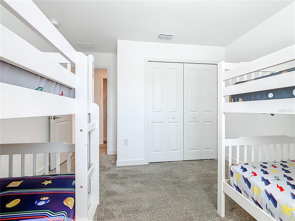 2957 Simile Street Kissimmee, FL 34746 - Photo 26 of 67 a view of an entryway with wooden floor