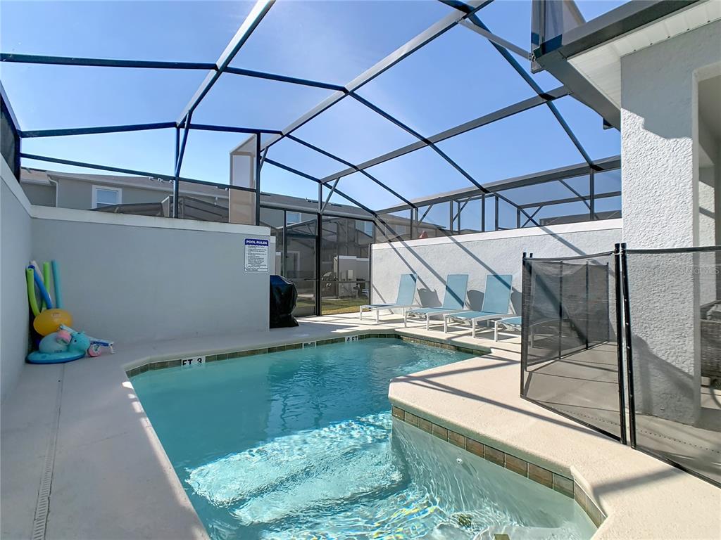 2957 Simile Street Kissimmee, FL 34746 - Photo 50 of 67 a view of a backyard