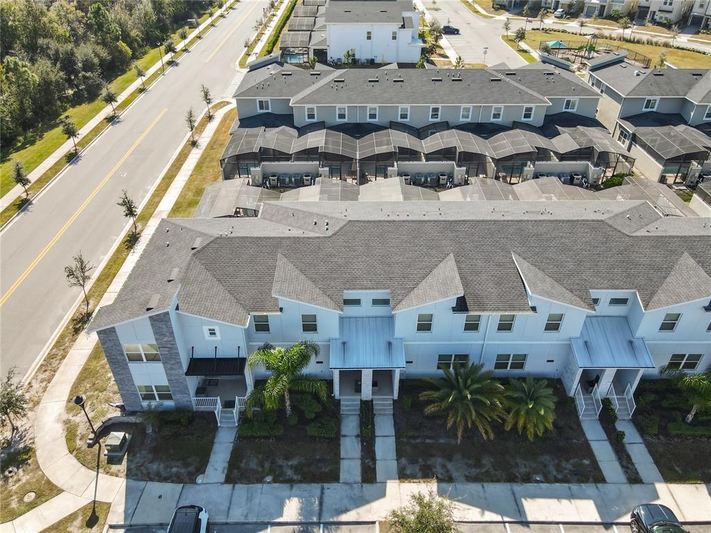 2957 Simile Street Kissimmee, FL 34746 - Photo 62 of 67 a aerial view of a house with table and chairs