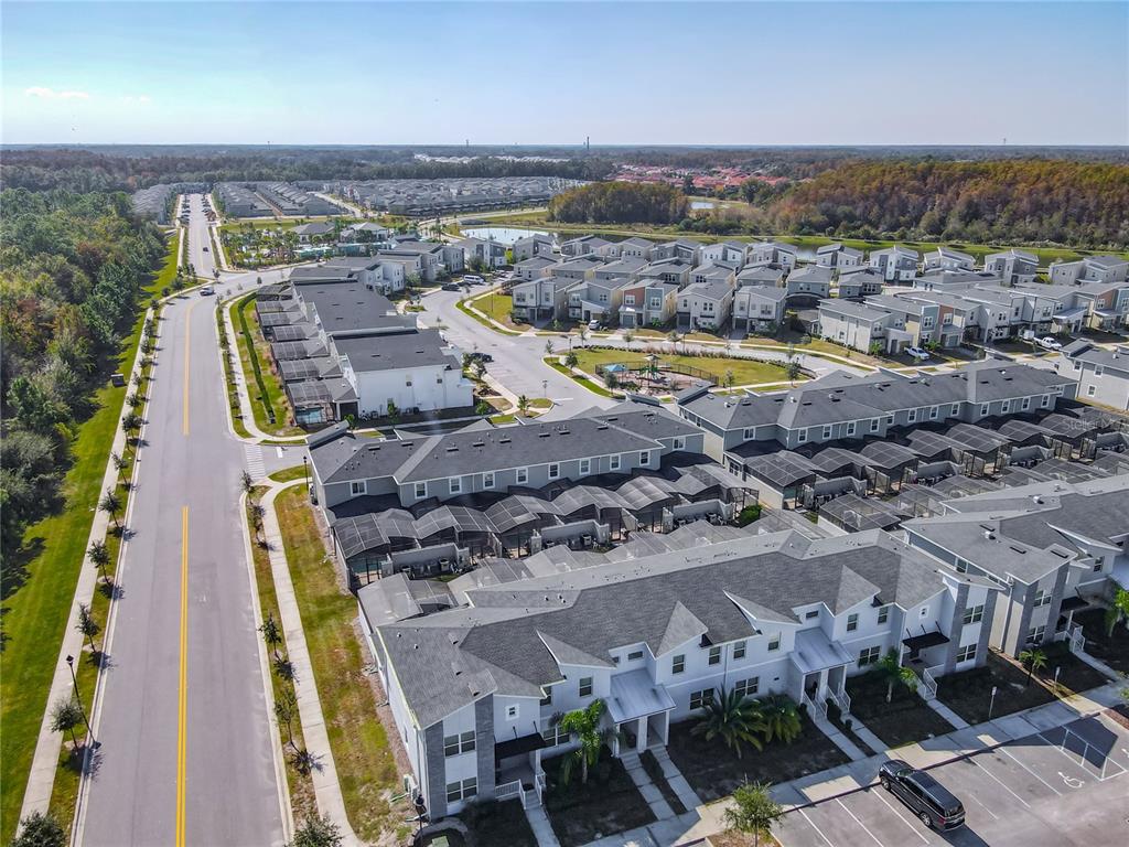 2957 Simile Street Kissimmee, FL 34746 - Photo 65 of 67 an aerial view of a house with a swimming pool
