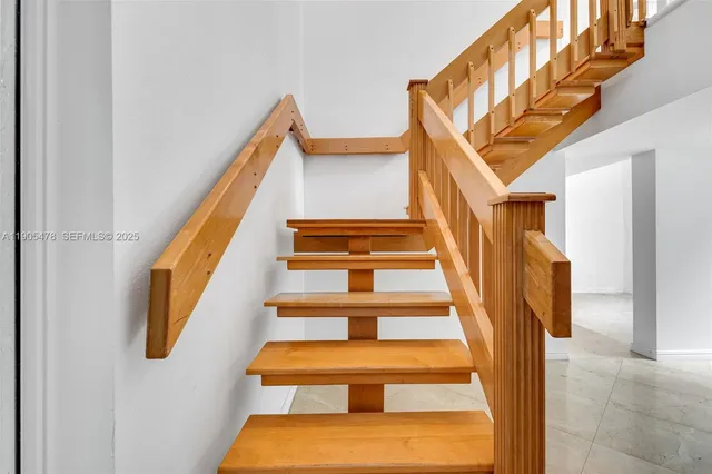 a view of livingroom with furniture and windows
