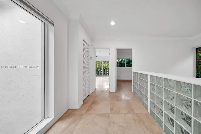 a large en suite bathroom with a tub sink and mirror