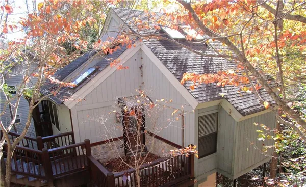 a view of balcony with furniture