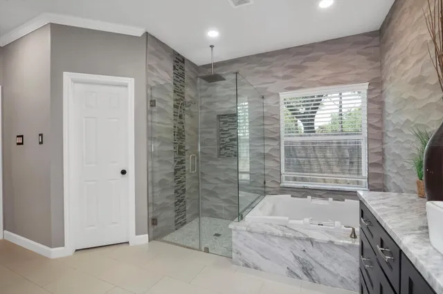 a view of a kitchen with a refrigerator and a sink