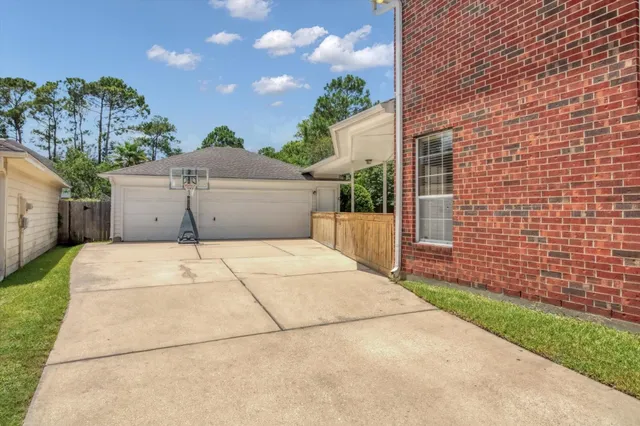 a view of living room with furniture and a fireplace