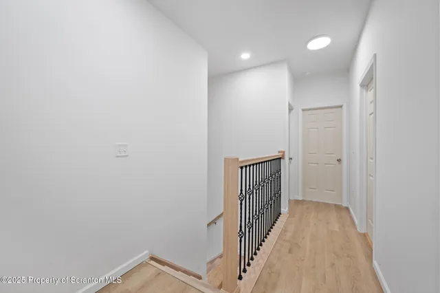 a view of a small space with racks on the wall