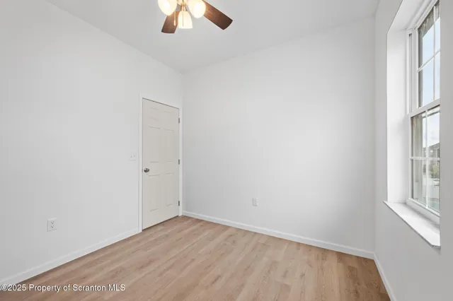 a view of small space with racks on the wall