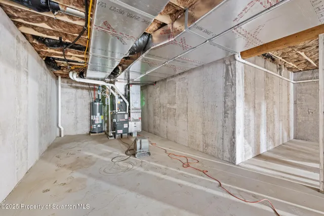 an aerial view of a house with a swimming pool