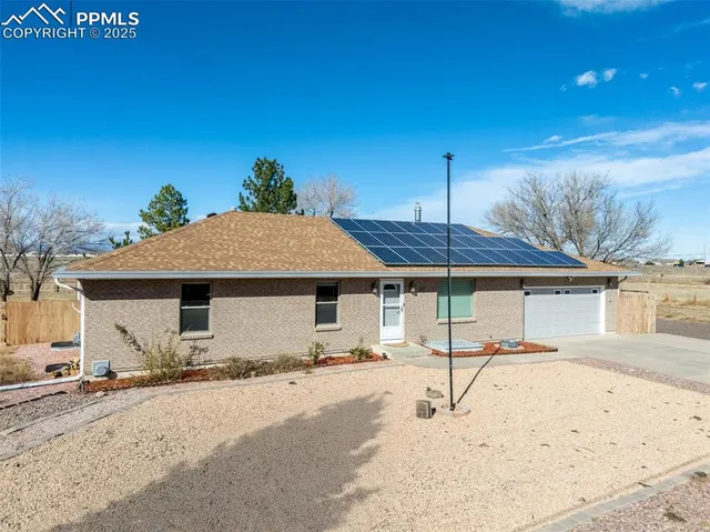 a view of a house with a snow