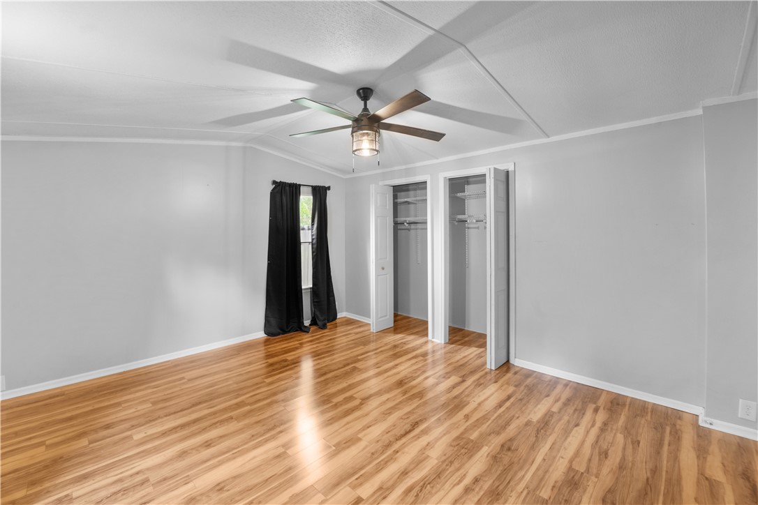 169 West Bagwell Road Liberty, SC 29657 - Photo 19 of 29 A versatile room featuring lustrous wood-look flooring and a modern ceiling fan for comfort.
