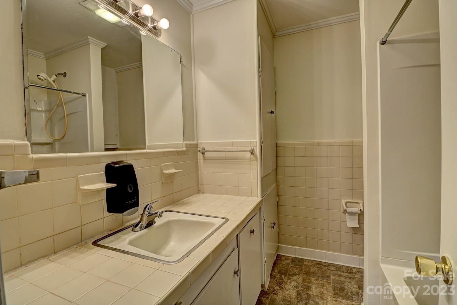 1408 Delview Road Cherryville, NC 28021 - Photo 17 of 23 a bathroom with a sink a toilet and shower