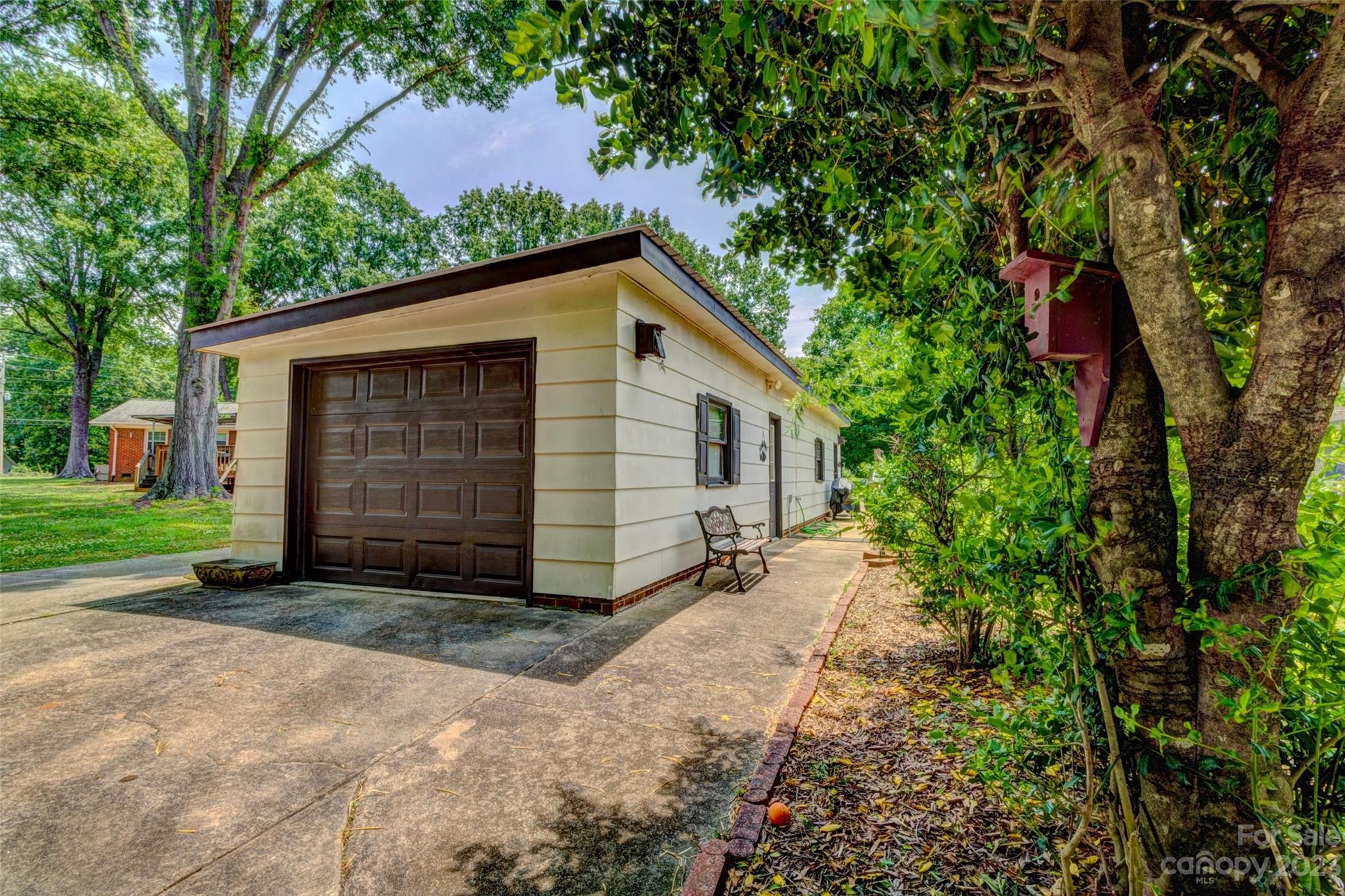 1408 Delview Road Cherryville, NC 28021 - Photo 21 of 23 a view of a house with a yard and garage