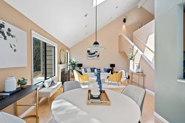 a view of a dining room with furniture window and outside view